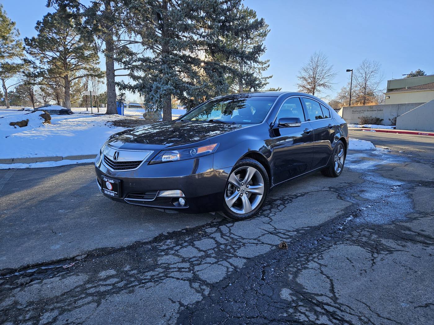 Dark sedan after an exterior detail