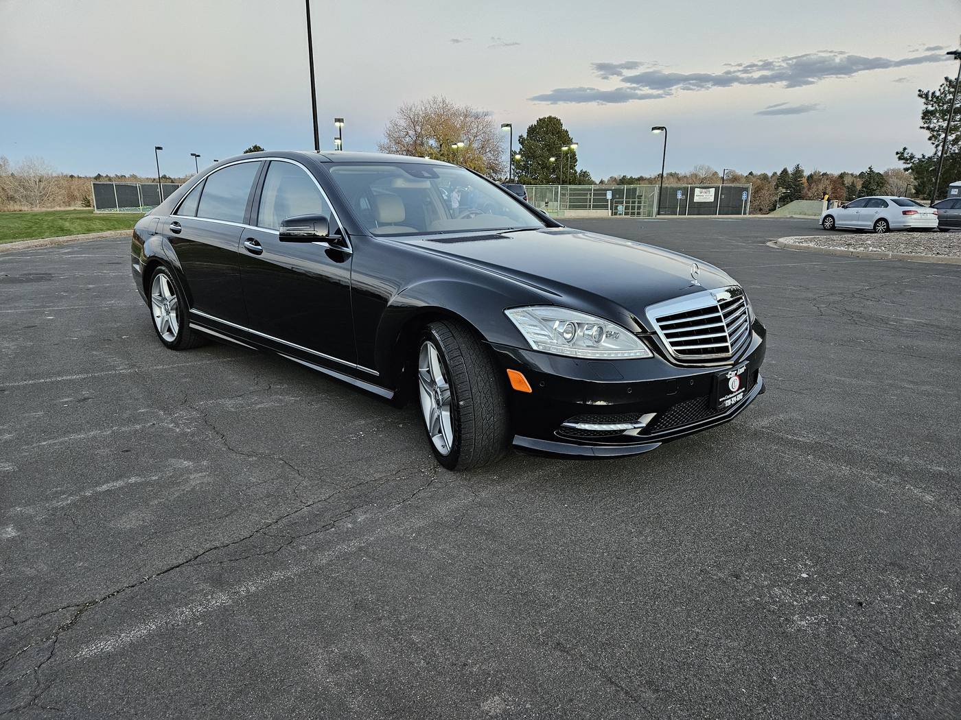 Black luxury sedan after a full detail