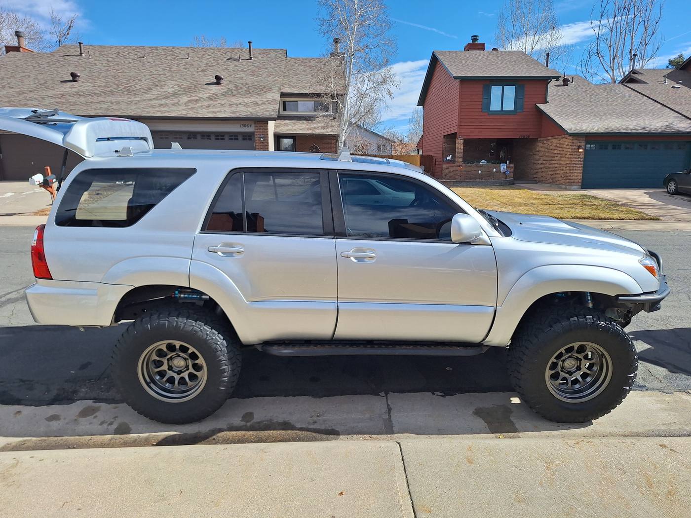 Silver lifted SUV after an exterior detail