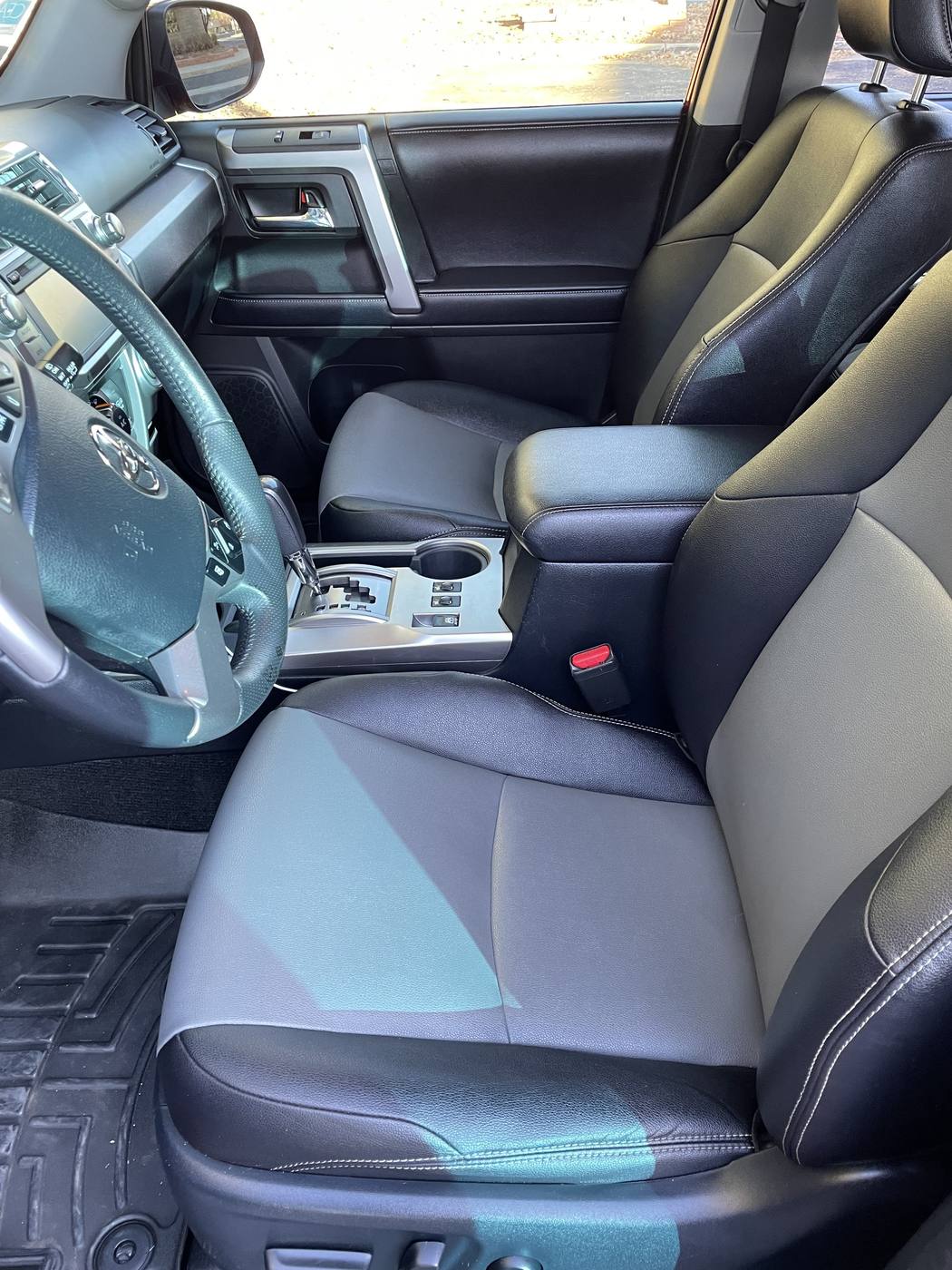 Cleaned and conditioned leather seats in an SUV